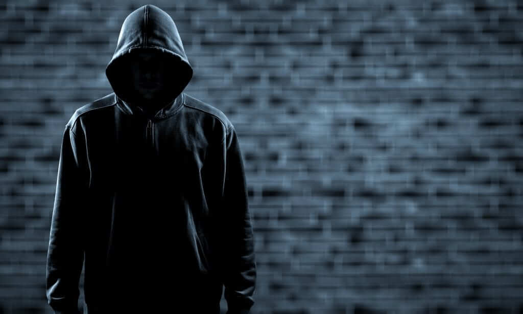 Thief,In,Black,Clothes,On,Grey,Background