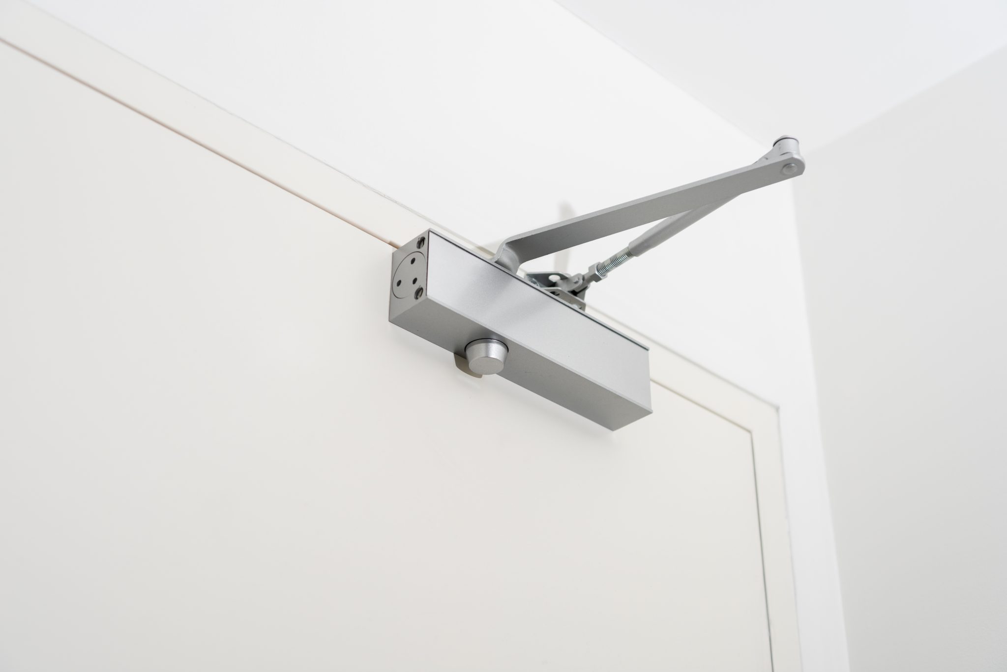 HoldOpen vs. NonHoldOpen Door Closers What Do Your Business Doors