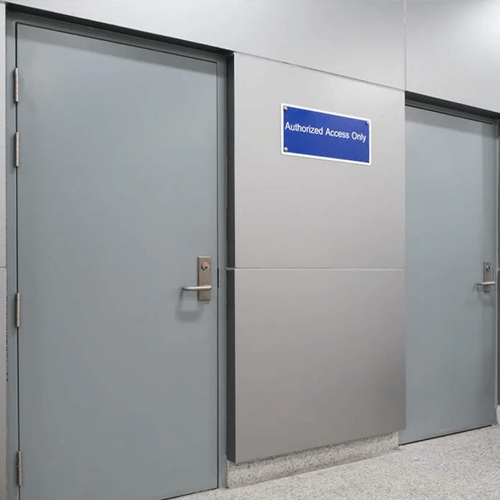 Commercial doors with continuous hinges