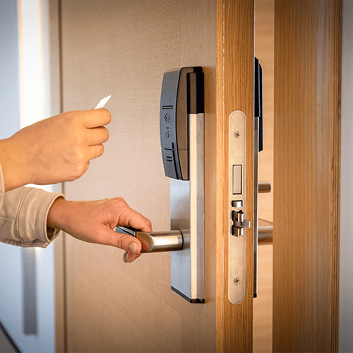 Commercial wood door with mortise lock.